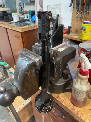 Axle with connection sleeve and u-joint bound